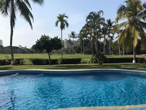 community pool with golf views.