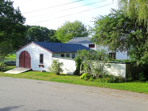 Curbside view of house and courtyard