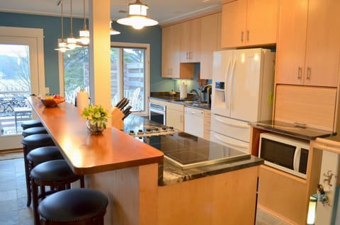 Kitchen with island and Viking induction cook top