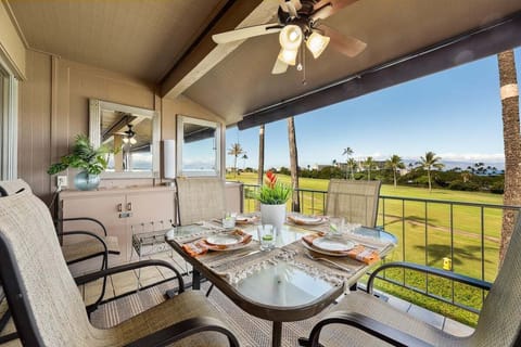 Enjoy outdoor dining on your private lanai overlooking the golf course