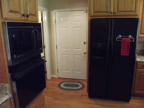 Exit to car garage from kitchen. 