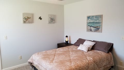 "Turtle themed" bedroom #1 with queen pillowtop bed, all bedding is furnished.