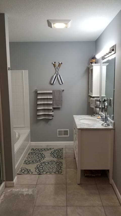 "Rowing" bathroom is connected to #1 "turtle themed" bedroom.