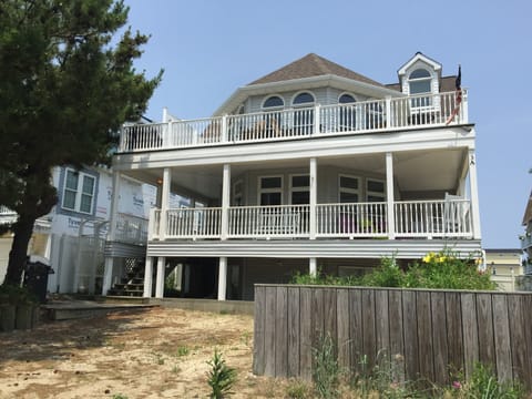 Front Elevation with 3 Parking Spaces. Unit space includes two covered porches.