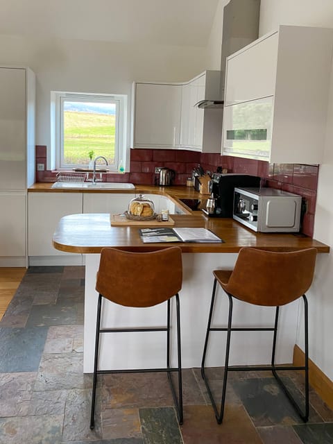 Kitchen island with bar stools