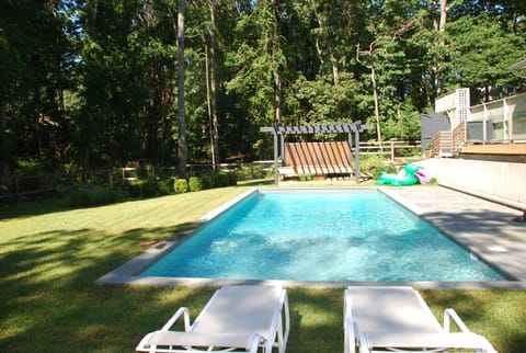 Pool Lounge area. Separate from the deck connected to the house and fenced in. 