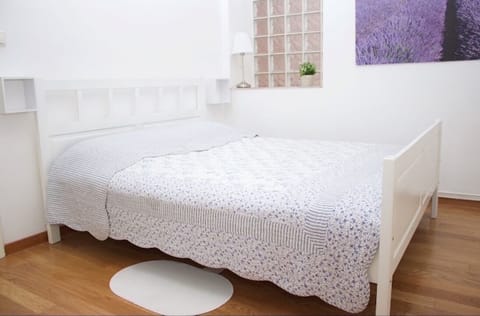 Master bedroom (160x200cm) with big  cupboard and a table.