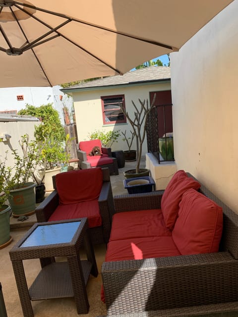 Spacious private back patio with shade and sun options.  Poodle puppy excluded!