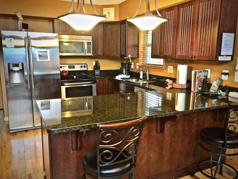 Open concept floor plan, and soaring ceilings offer a light and bright feeling