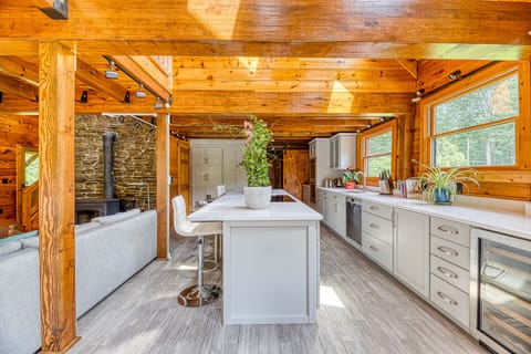 Kitchen island with 4 stools and induction cooktop & downdraft - a chef's dream!