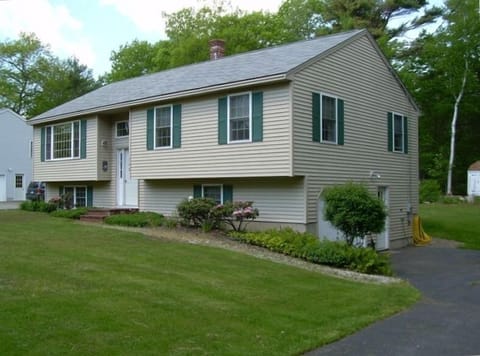 Front of house,plenty of paved parking.
