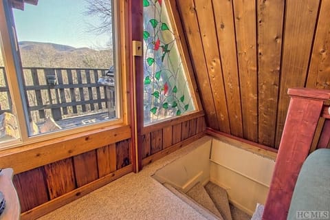 Main floor stairs to lower level family room