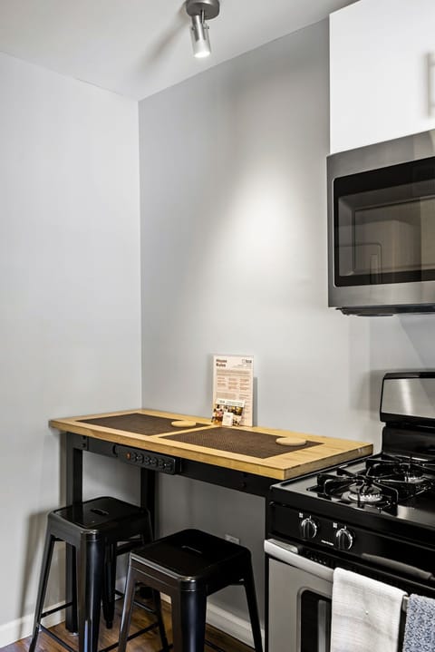 Brookwood Courtyard Condos - Kitchen - Bamboo Bar Table has Charging