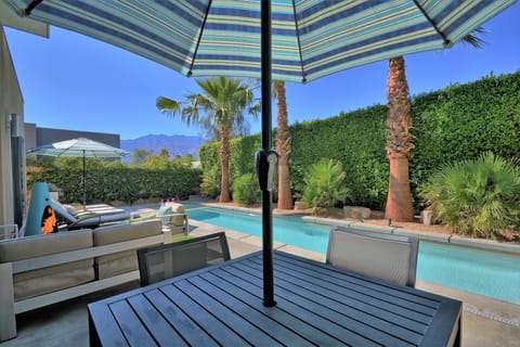 Your private rear yard with pool, spa, gas fire feature and plenty of seating.