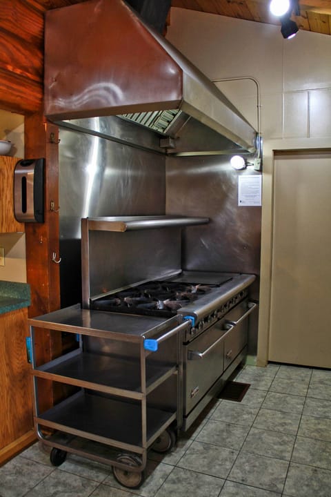 Convection range with 2 ovens, 6 gas burners, and warming griddle