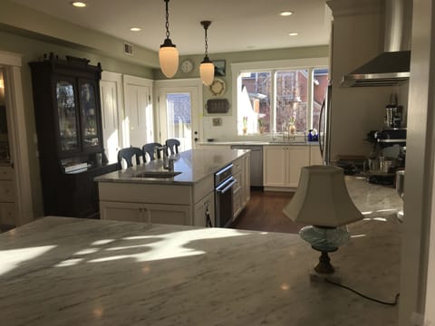 Great kitchen to hang out with coffee. Love the morning sun!