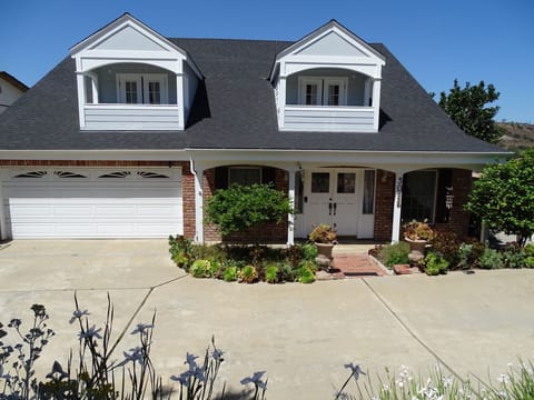 Walk in and feel instantly comfortable in this Cape Cod home near San Diego.