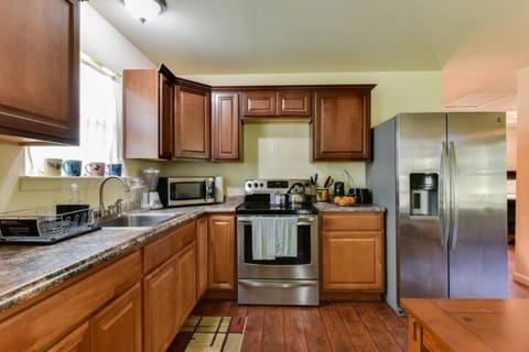 large, well-stocked kitchen with complimentary breakfast supplies