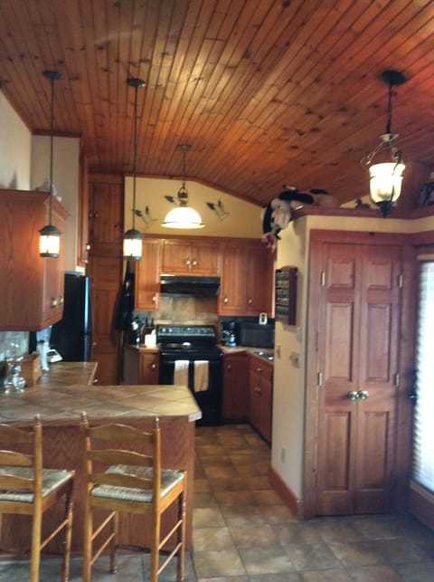 Kitchen are with Vaulted Ceiling