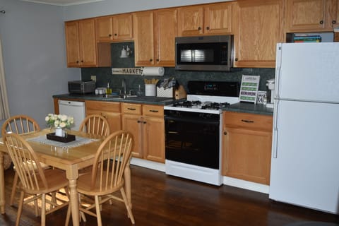 Full kitchen with dining area