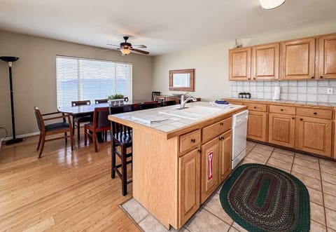 Spacious kitchen with warm wood finishes—perfect for gathering, cooking, and creating lasting memories.
