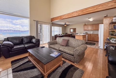 Spacious living with stunning lake views—perfect for relaxing, dining, and gathering with loved ones.