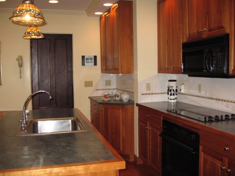 Kitchen; door to dining room in the rear