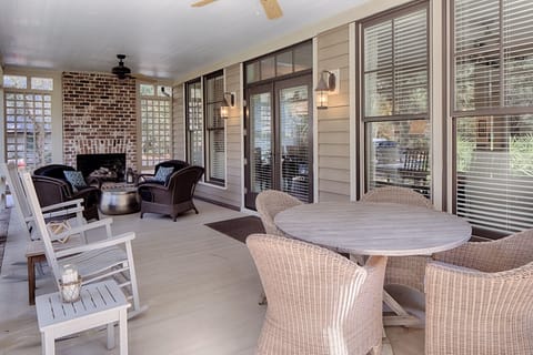 Outdoor fireplace and sitting area.