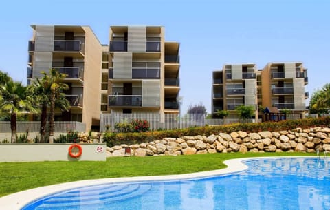 Take a refreshing dip in the gorgeous outdoor pool set in lush gardens.