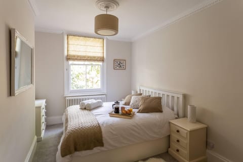 Master Bedroom with ample space for a cot