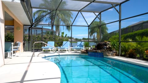 Newly Expanded Resurfaced Pool with Safety Bar & Tropical Watefall