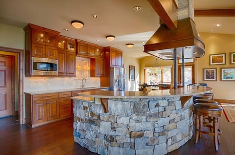 Indoors, Kitchen Island, Flooring, Furniture, Hardwood