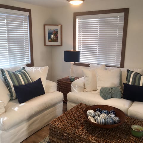 Heavenly  down filled sofa and chair, xtra storage rattan coffee table.