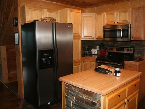 Full kitchen with all cooking supplies provided.  Brand new Dishwasher as well.