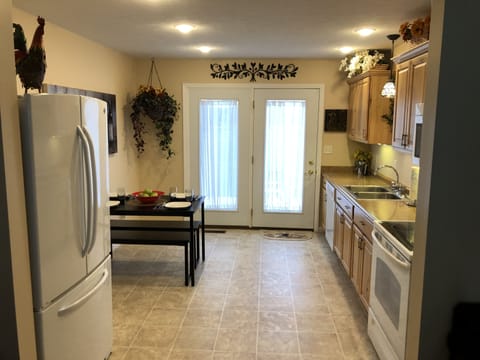 Eat-in kitchen with everything you need to cook your own meals.