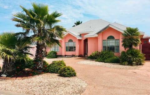Circular driveway out front and Ample adjacent paved parking