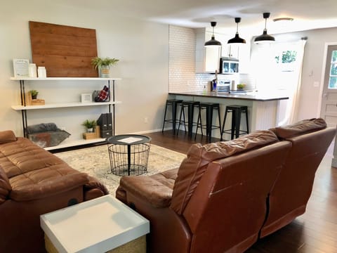 Super comfy yet stylish living area that is open to the kitchen area.