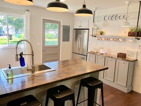 You'll love the open concept, fully stocked kitchen!