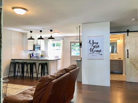 Super comfy yet stylish living area that is open to the kitchen area.