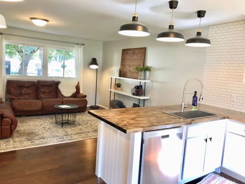 You'll love the open concept, fully stocked kitchen!