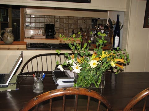 The dining table accommodates 8 or 10 with the leaf.