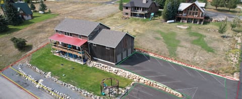 Red outline shows property, green shows vehicle parking & Yellow truck w/trailer