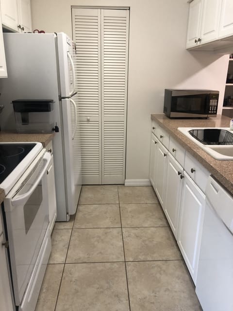Kitchen with all necessary appliances. Extra in pantry. Microwave, toaster etc.