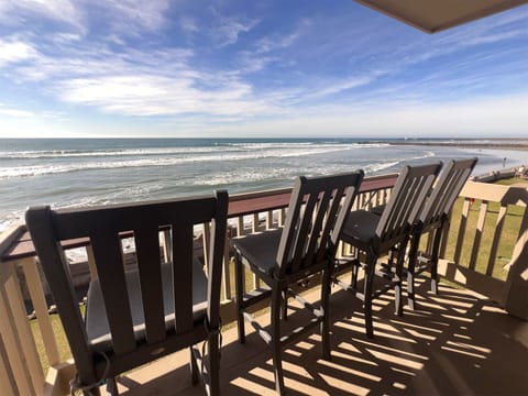 Beachfront retreat featuring sweeping ocean views from the patio—perfect for sunset dinners by the sea or savoring your morning coffee to the sound of the waves