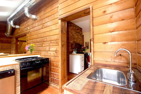 Second kitchen with sink in the sunroom.