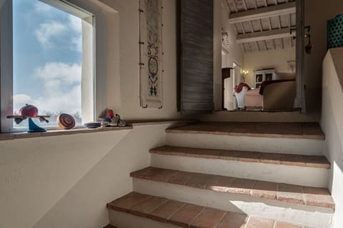 Staircase to first floor living room and two bedrooms 