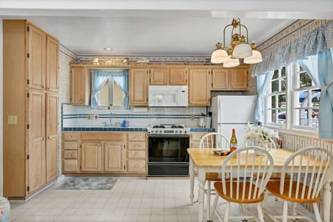 The kitchen is adjacent to the main room and is a great gathering place for everyone to decide what today's plan will be!