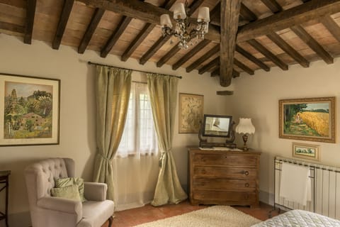 Large pretty double bedroom with wash basin.