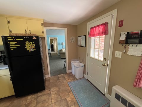 View from the kitchen into the family area. 