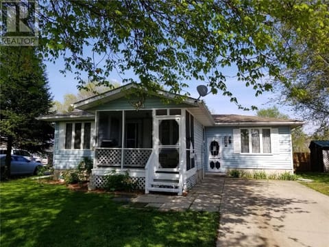 Welcome to a charming spot!  Parking available, sit on the screened porch!